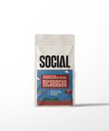 Coffee packaging with 'SOCIAL' branding on a white background